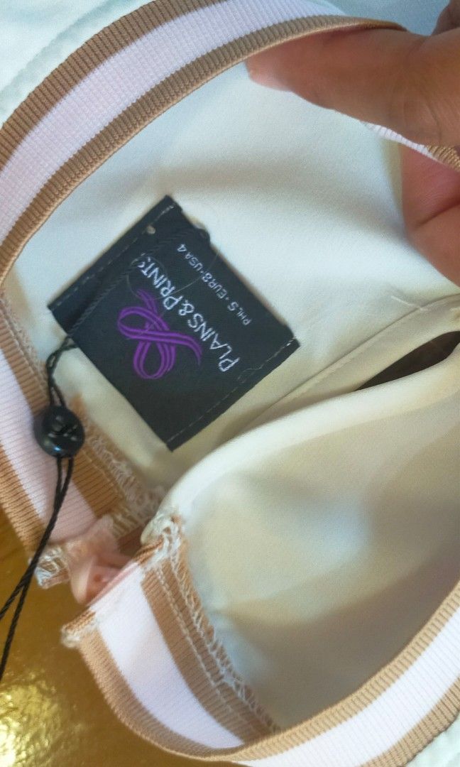 plains and prints dress (Category: Dresses) located in Malabon City. Submitted by winron23 (Listing ID 1222596446, Image 3). Description: brand new without tag, niwashed lang then stored sa cabinet size small but can fit up.to.med.