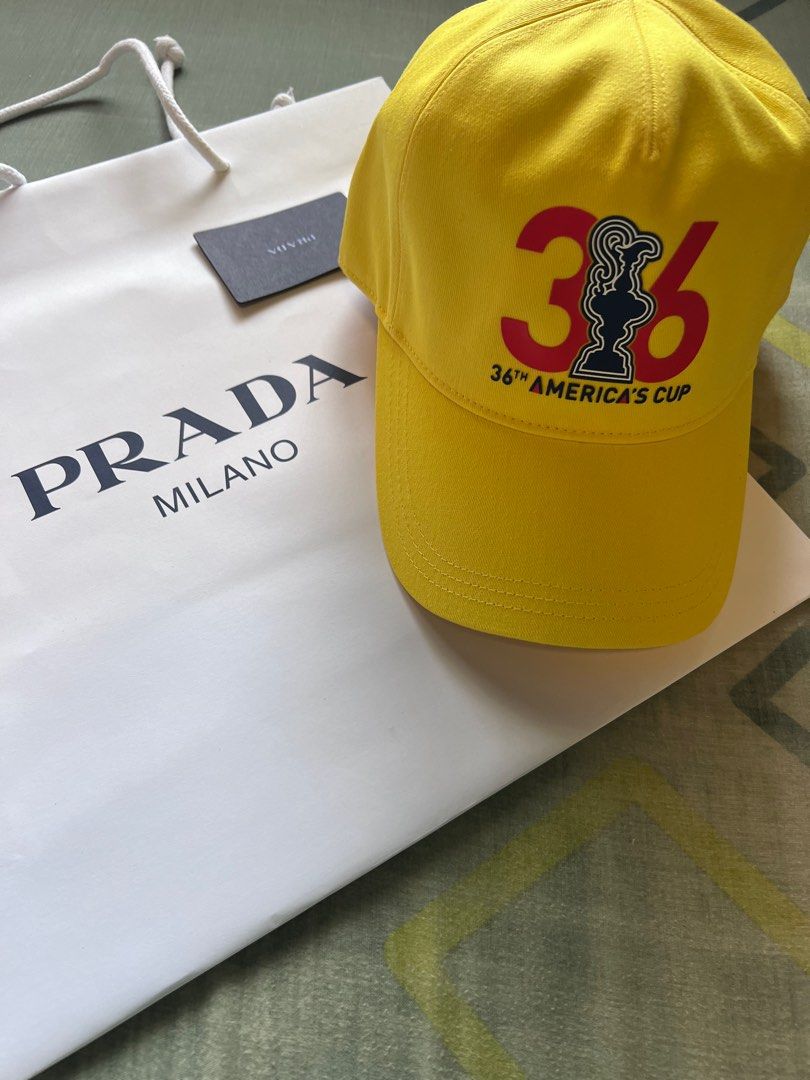 Prada 36th America's Cup Cap (Yellow) (Category: Caps & Hats) located in Legazpi City. Submitted by mechan88 (Listing ID 1222445248, Image 2). Description: Purchased From Prada Italy Brand New with Tags and Paperbag Color: Yellow Size: M .