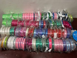ASSORTED PLASTIC AND SATIN RIBBONS