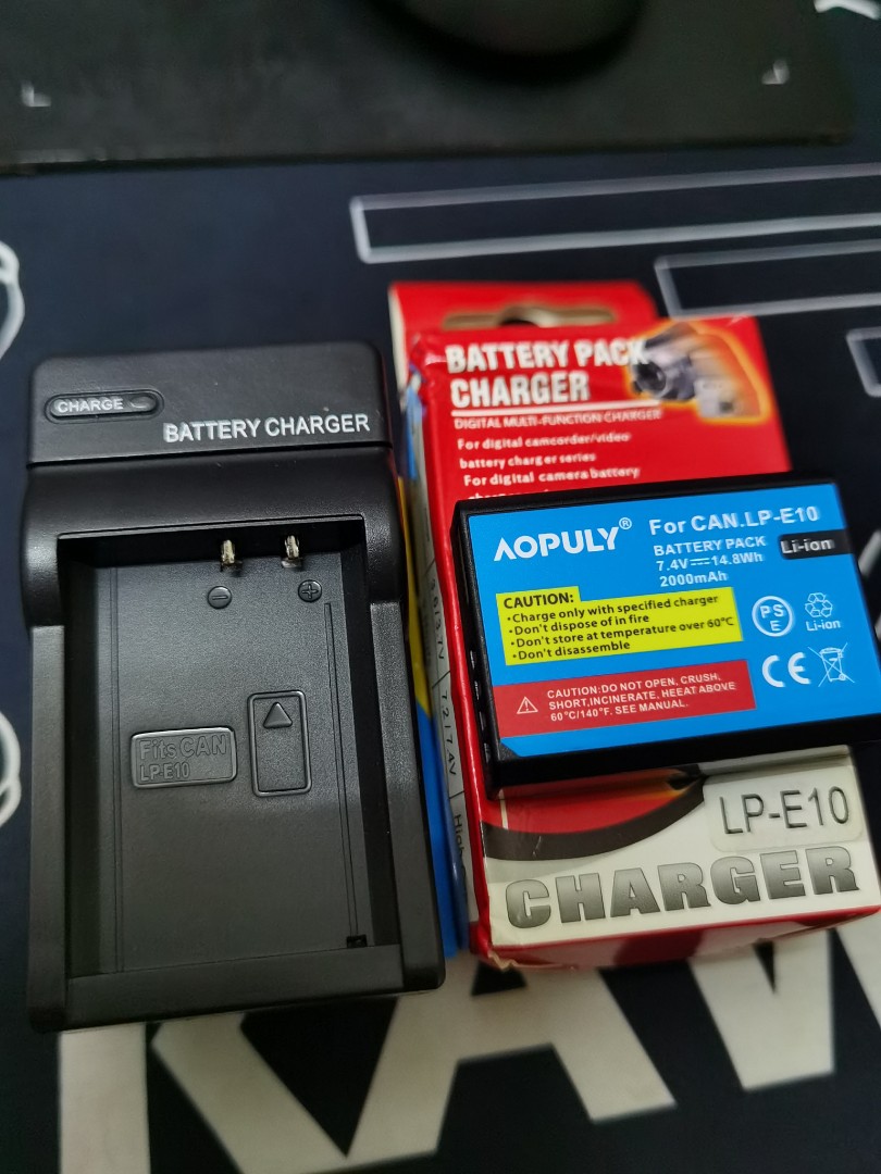 Canon LP-E10 new battery & charger, Photography, Photography Accessories,  Batteries & Chargers on Carousell