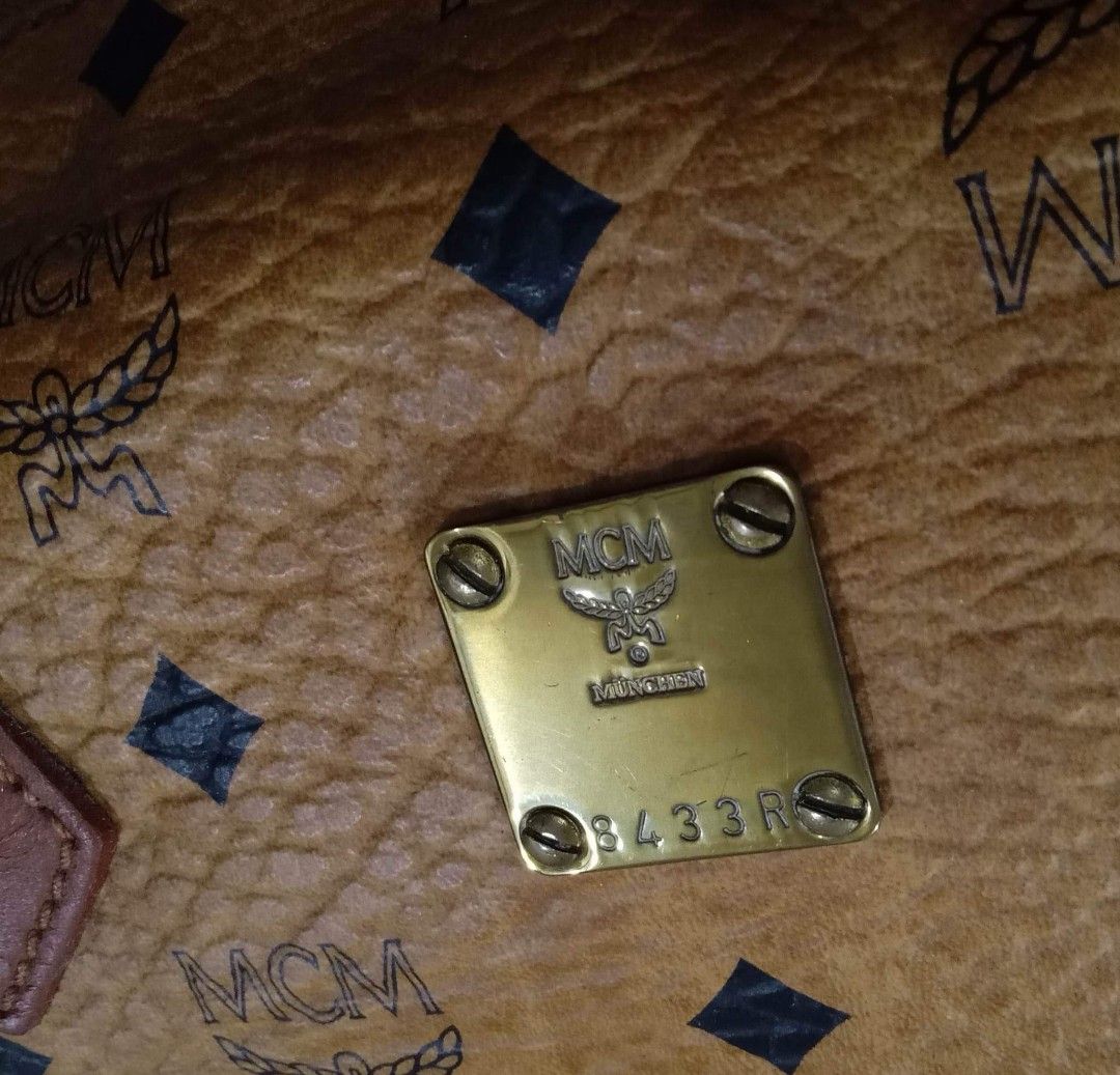MCM Cognac Bandouliere Type (Category: Luxury Bags & Wallets) located in Taguig. Submitted by esa.agustin (Listing ID 1222648467, Image 3). Description: Original MCM cognac bandouliere type bag. Size 25 cm. With dust bag and original strap. Made in Germany.