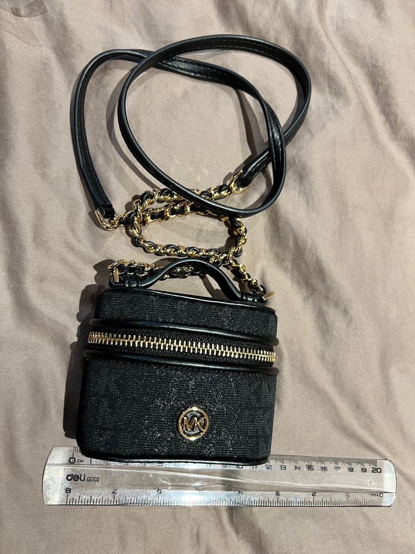 Michael Kors Mini Sling Chanel Vibes, Women's Fashion, Bags & Wallets,  Purses & Pouches on Carousell