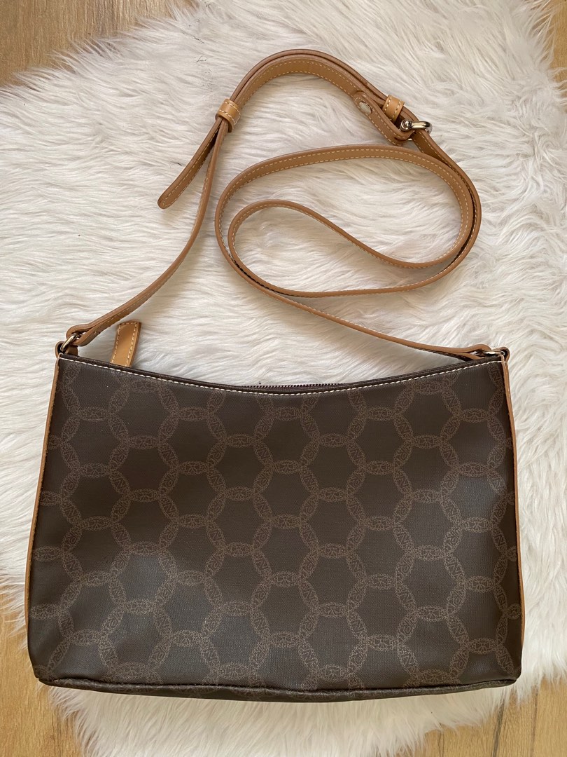 Nina Ricci Sling bag, Luxury, Bags & Wallets on Carousell