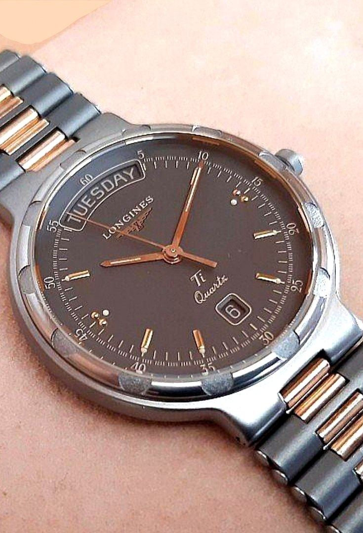 Longines conquest day date outlet