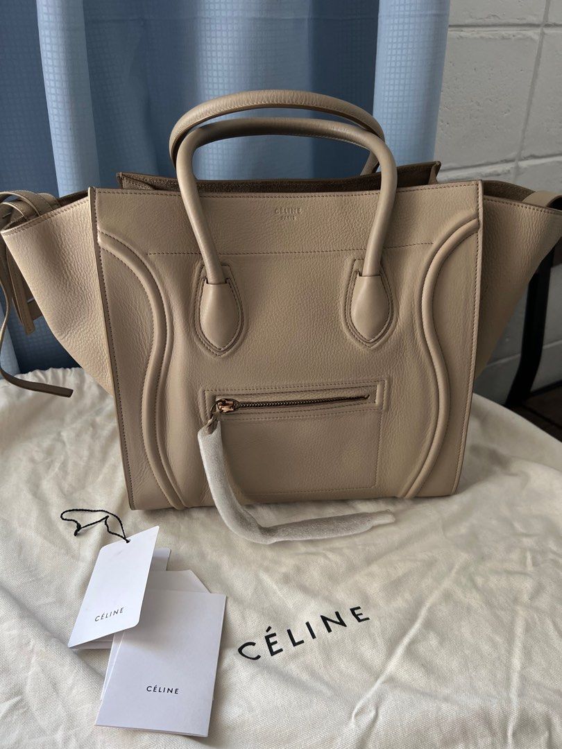 Like NEW Celine Medium Phantom in Dune Grained Calfskin (Category: Luxury Bags & Wallets) located in Marikina City. Submitted by caseykace (Listing ID 1222905851, Image 1). Description: The Medium Celine Phantom measures at 11"' H X 12" W x 10" D. It has a 5-inch handle drop and be carried by hand or on the arm. The Medium Celine Phantom fits folders and large envelopes. Bought for $3,400 in NYC. Peice still negotiable. Just stored, used once. A 