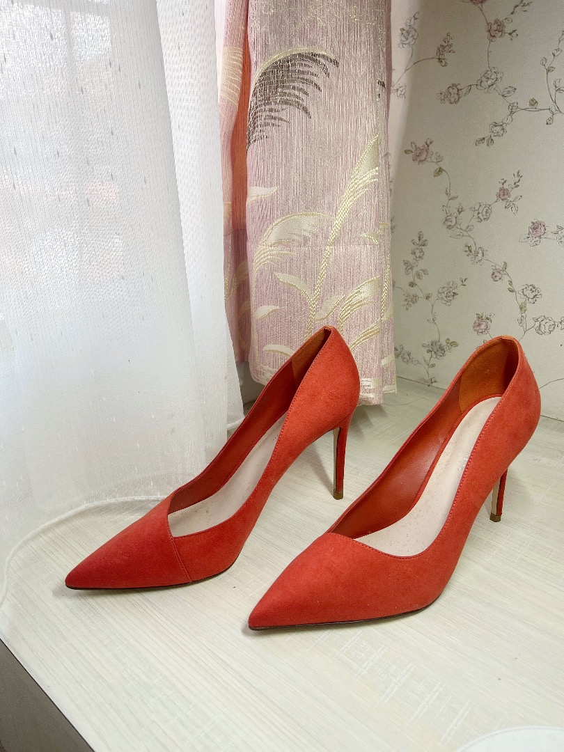 Burnt store orange pumps