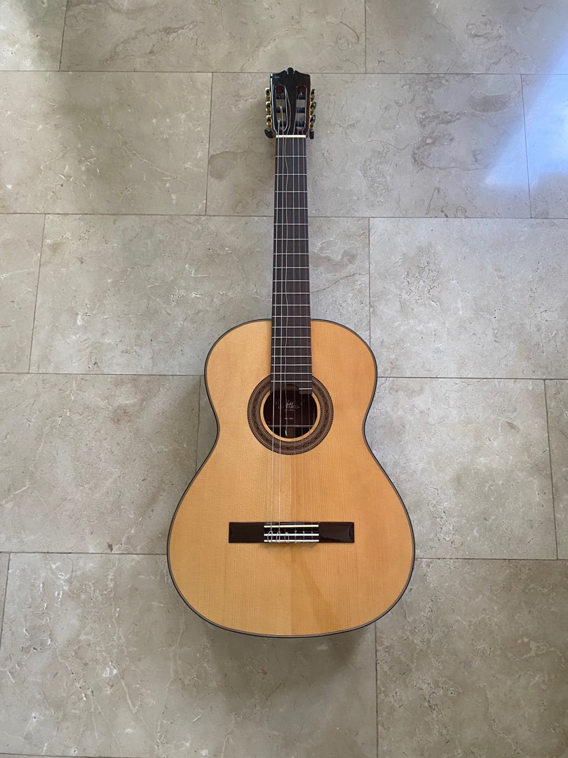 Martinez sales hauser guitar