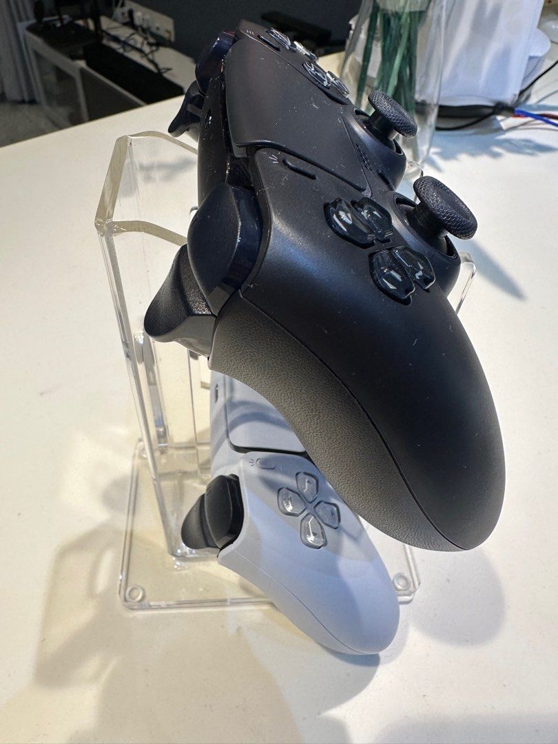 Controller Stand (Category: Controllers) located in Singapore. Submitted by cire84 (Listing ID 1222975537, Image 3). Description: Control stand suitable to hold 2 control of any platform (PS4, PS5, XBox).