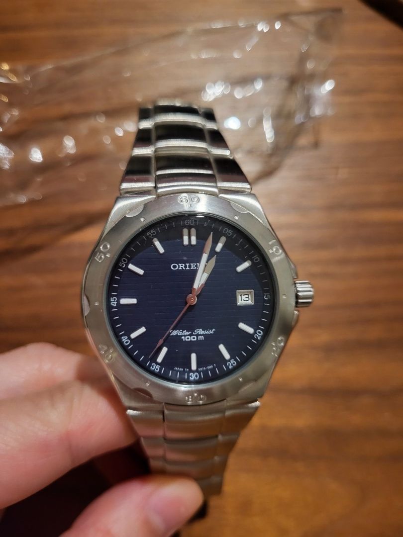 Orient water men s watch water resist 100m blue face date