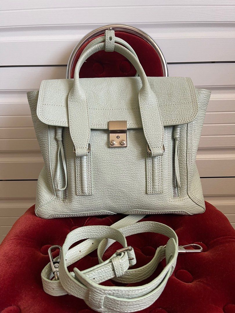 Philip Lim 3.1 Pashli in Mint (Category: Luxury Bags & Wallets) located in Paranaque City. Submitted by missthrifttease (Listing ID 1222897392, Image 2). Description: Comes with its original sling strap. Minor signs of use. Could use a bit of leather cleaning. Please carefully check photos. No filters used so you can see the flaws (if any). See previous post for other photos. Actual color may vary due to lighting. Payment via bank transfer or Gca