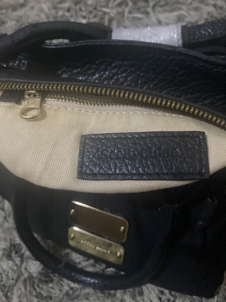 See by chloe small hand /sling bag (Category: Luxury Bags & Wallets) located in Pasig City. Submitted by pick_shoppe (Listing ID 1222858278, Image 3). Description: -vintage see by chloe -legit -no major flaws ( no rubs) -front metal with sign of used -9.5/10 in excellent condition -12” x 7”.