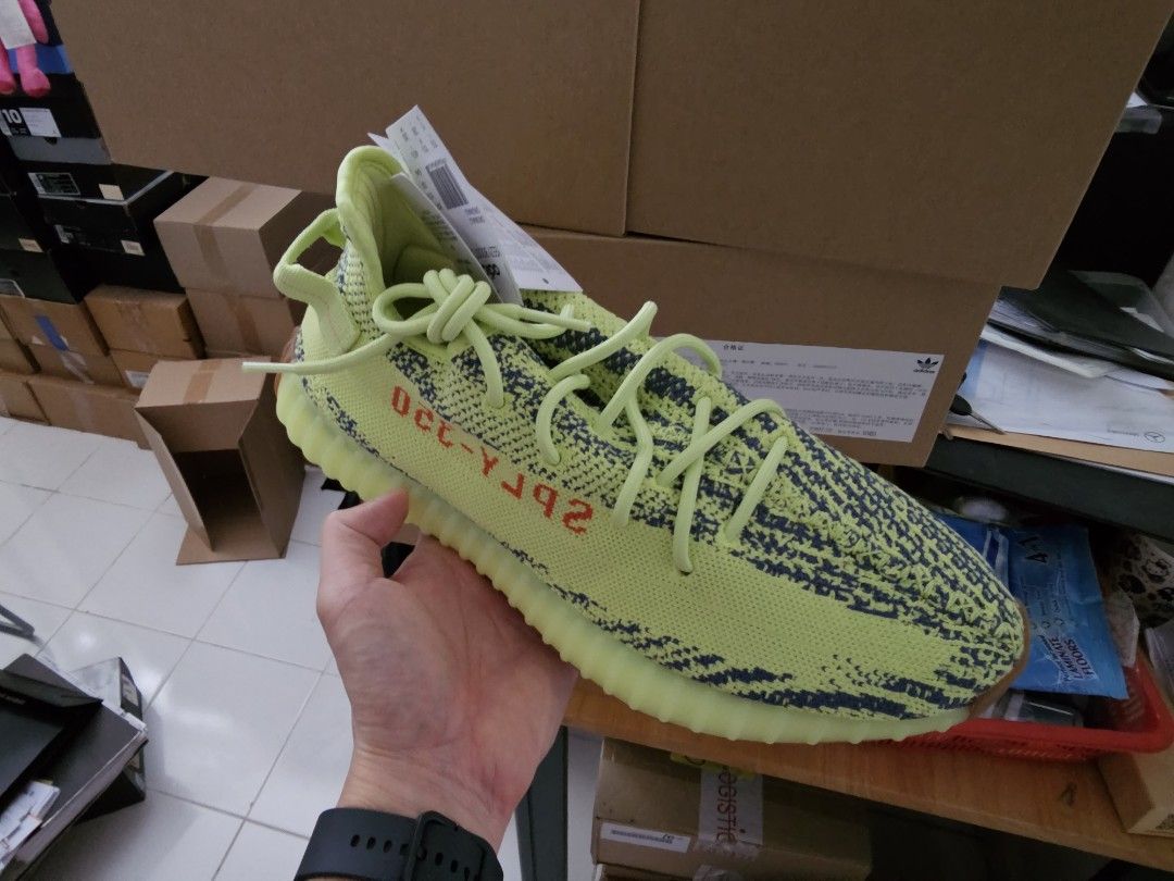Semi frozen yellow yeezy on feet store