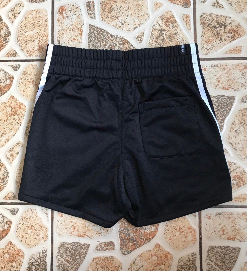 Adidas Womens 3 Stripes Shorts (Category: Activewear) located in Manila. Submitted by mr.quicky (Listing ID 1223015688, Image 3). Description: Brand new with tag legit size 28 womens garterize Side pocket and 1 Back pocket.
