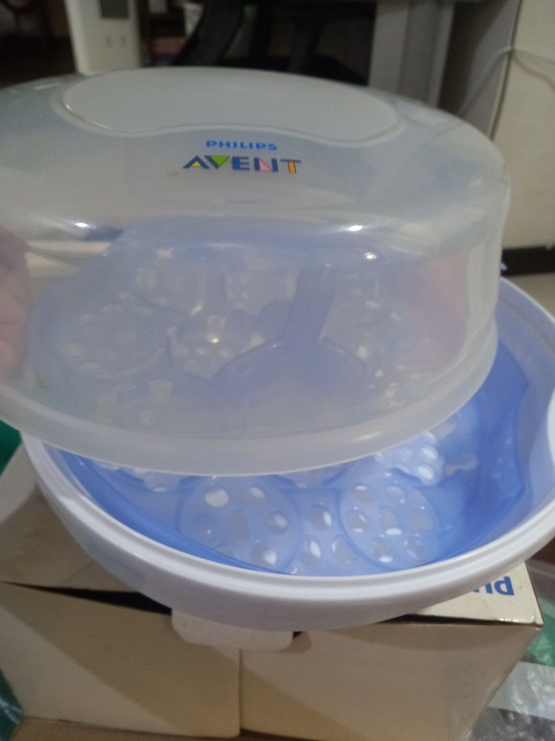 Avent portable (microwaveable) sterilzer (Category: Breastfeeding & Bottle Feeding) located in Quezon City. Submitted by inakiw (Listing ID 1223080475, Image 2). Description: complete with box comes with manual with free pacifier (also avent).