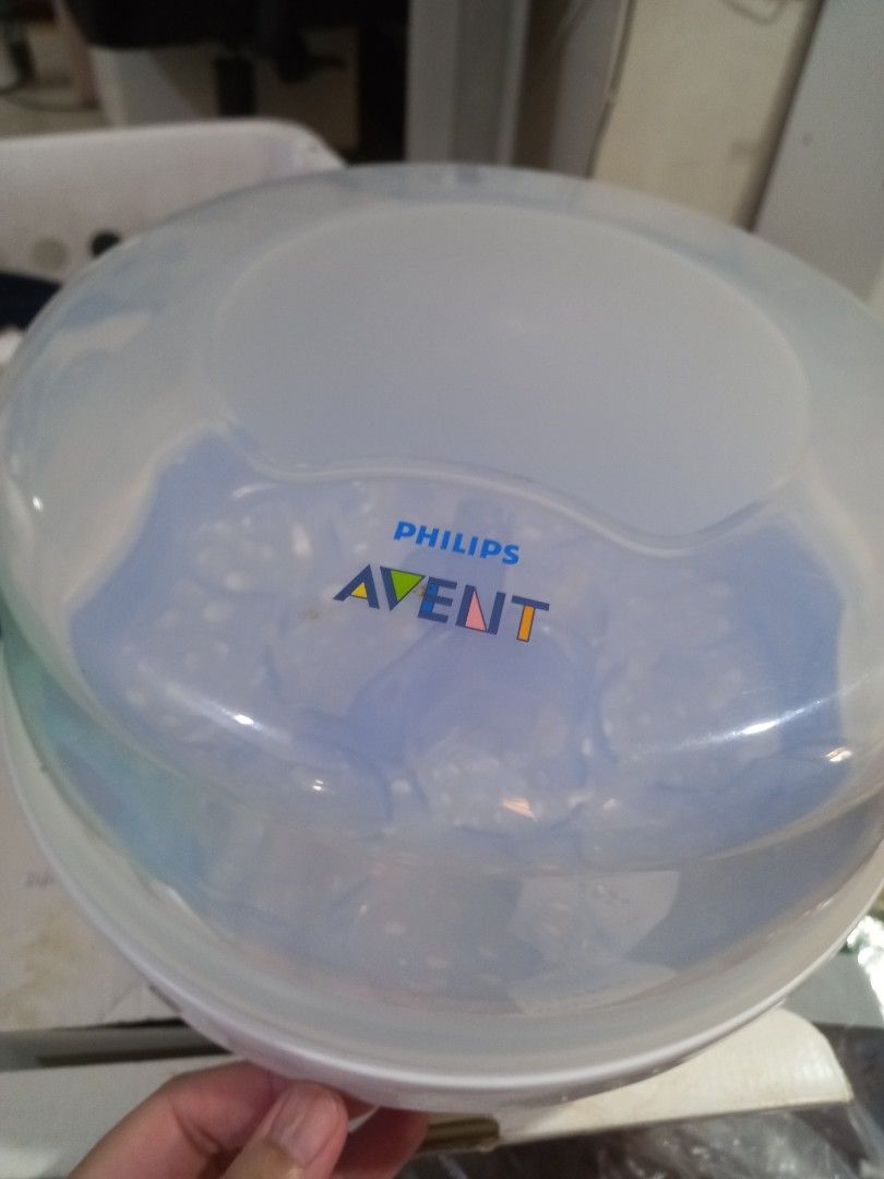Avent portable (microwaveable) sterilzer (Category: Breastfeeding & Bottle Feeding) located in Quezon City. Submitted by inakiw (Listing ID 1223080475, Image 3). Description: complete with box comes with manual with free pacifier (also avent).