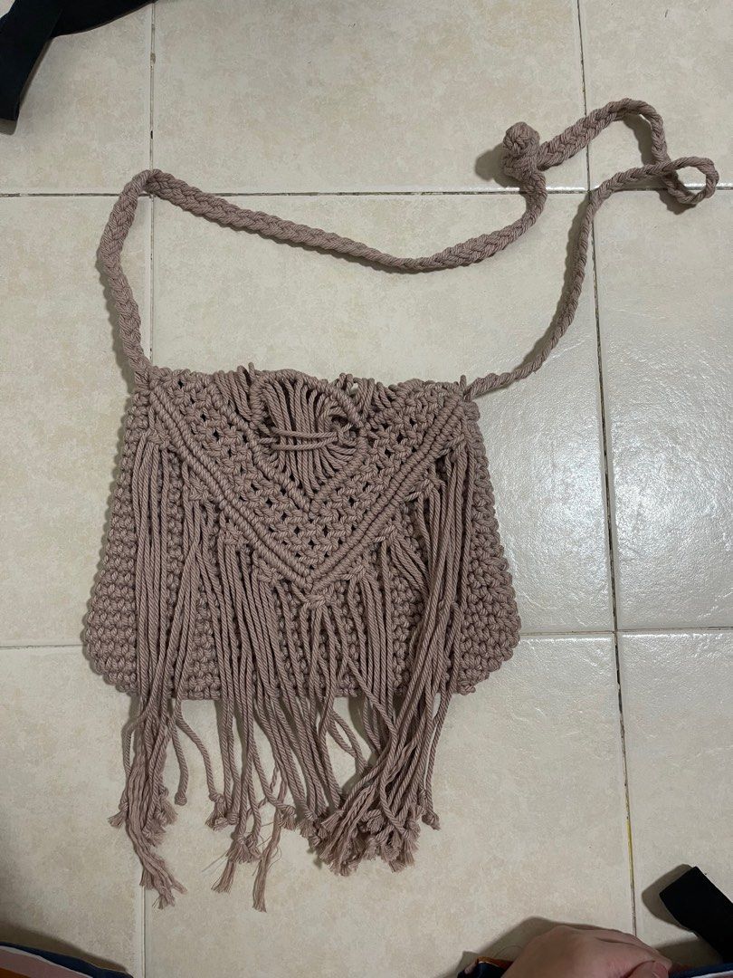 Drawstring bag (Category: Cross-body Bags) located in Singapore. Submitted by rebagpreloved (Listing ID 1223077570, Image 1). Description: Bought it in BALI Brand new Normal mail $1 Meet ups along wdls mrt-amk mrt.