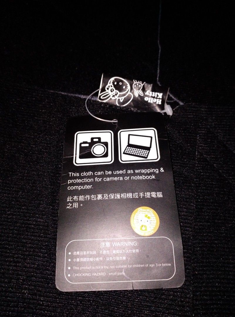 Missy's HELLO KITTY Black Wrapping Cloth|Protector for Camera or Notebook Computer (Category: Cases & Covers) located in Baguio. Submitted by missyjhen81 (Listing ID 1223038156, Image 3). Description: Welcome to Missyjhen81 The Second Chance Shop! We sell pre-owned clothes, bags, wallets, toys, accessories and more. We take great care in selecting the items we sell to ensure that they are of good quality. We believe that buying second-hand is not