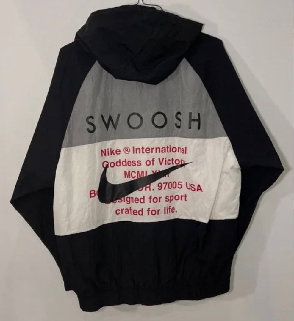 swoosh nike windbreaker