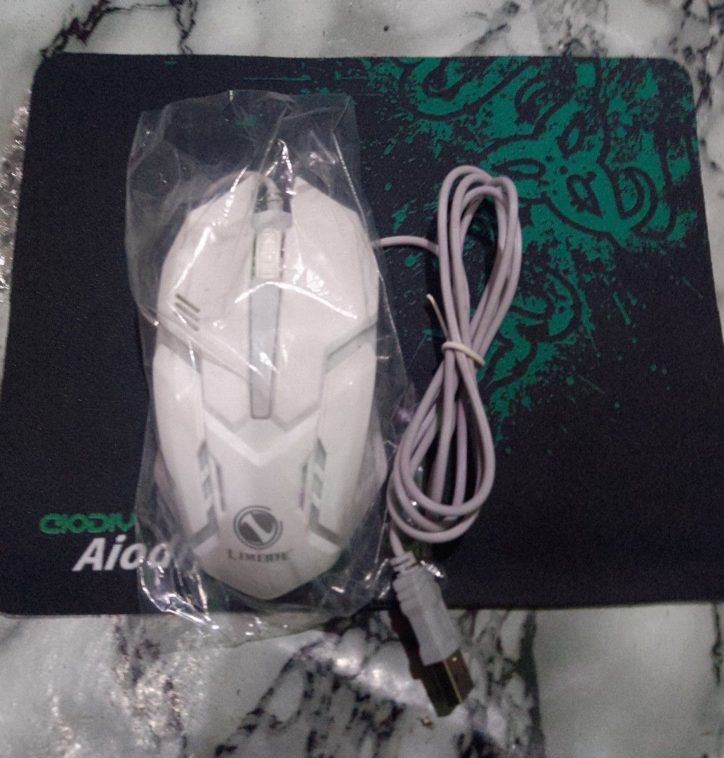 RGB Led Lights Gaming Mouse and mousepad (Category: Mouse & Mousepads) located in Cainta. Submitted by whiteelephantph (Listing ID 1223022296, Image 2). Description: bnew. RGB Led Lights Gaming Mouse and mousepad Mouse and mouse bundle ₱120 black and white color available Yung ilaw nya nagpapalit palit every second Pickup or lalamove Pm is the Key!.