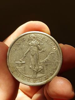 1909 One Peso USPI (AU details)