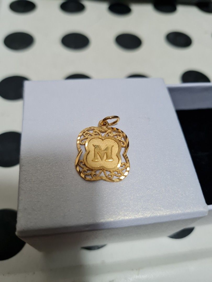 Gold locket discount m design
