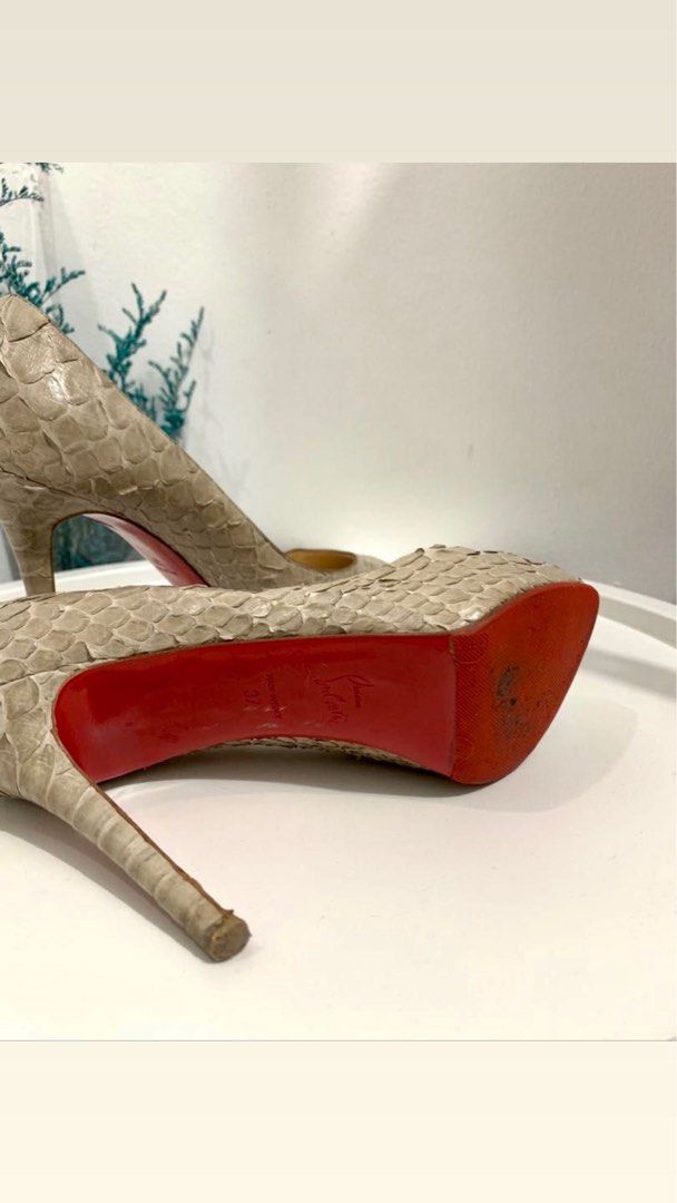 Authentic Christian Louboutin Snakeskin Pumps (Category: Heels) located in Mandaluyong City. Submitted by jzd23 (Listing ID 1223250731, Image 3). Description: Second hand. Please scrutinize photos first. No inclusions. Slightly negotiable. .