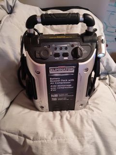 Battery booster with air compressor