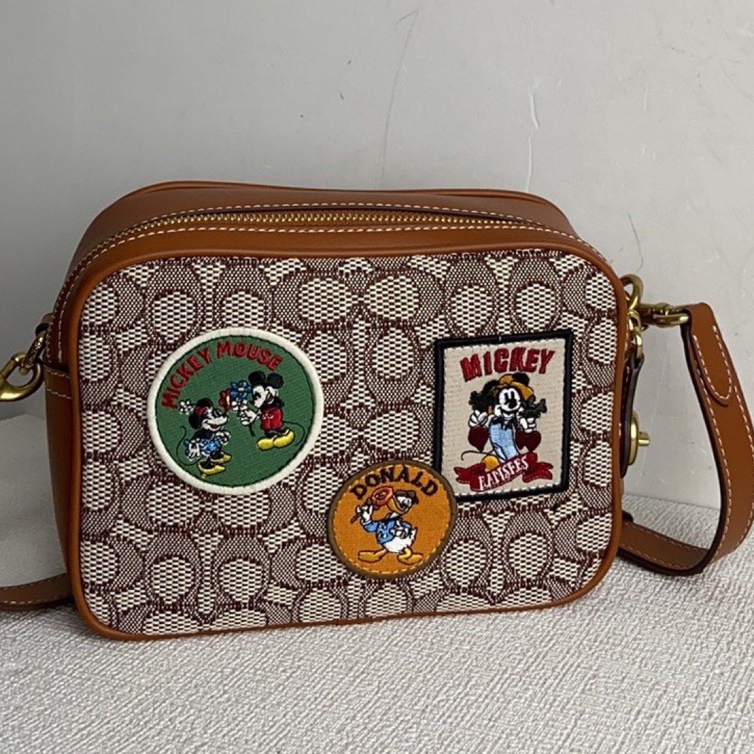 Coach disney clearance sling bag