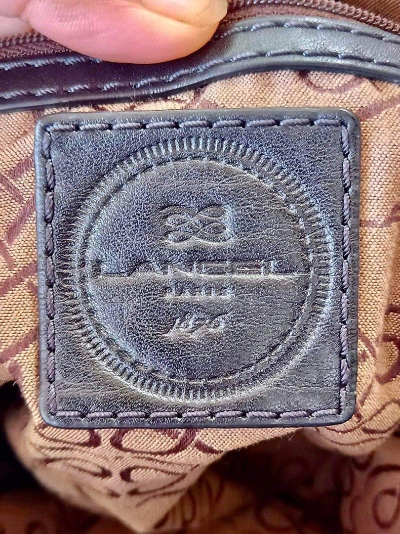 Coded Vintage Lancel Paris Boston Tassel (Category: Luxury Bags & Wallets) located in Pagadian. Submitted by lightbagelyas (Listing ID 1223379819, Image 2). Description: LANCEL Paris Boston Tassel Coded YKK zipper Genuine Leather Silver Hardware Sign of usage sa handle Crocskin Hologram Lining More photos will be provided upon request .