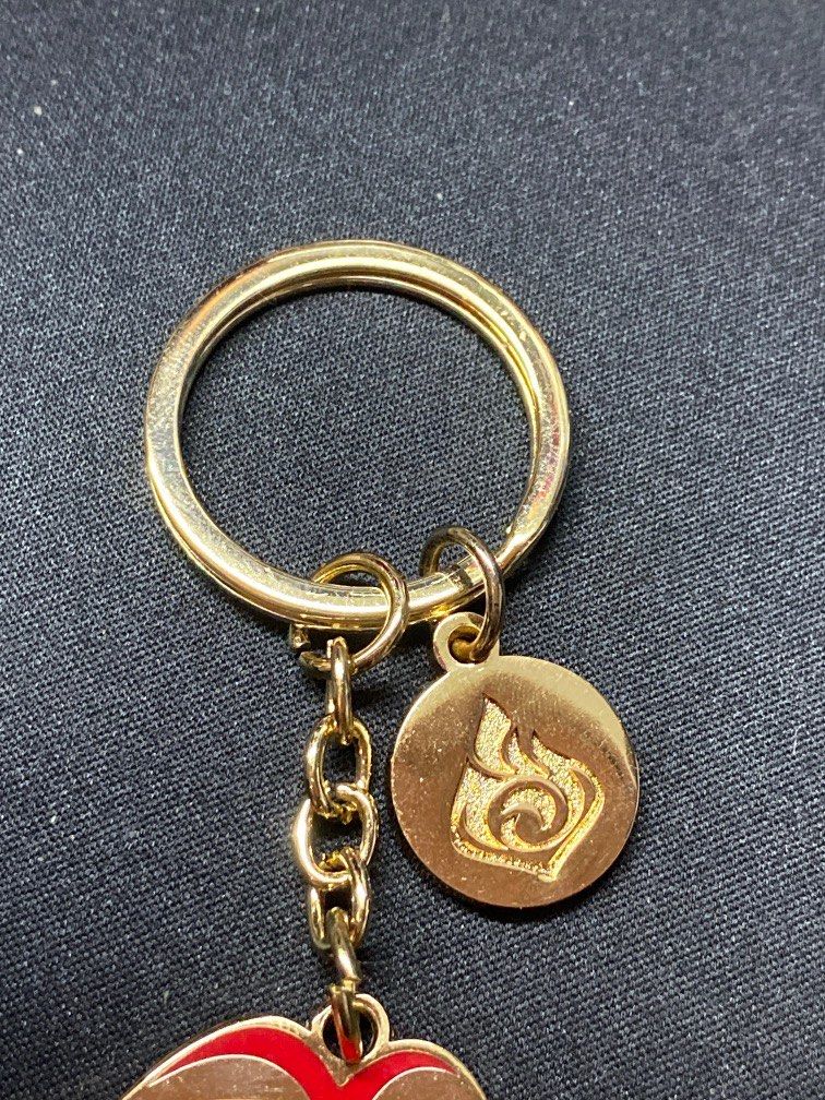 Diluc Official genshin metal keychain, Hobbies & Toys, Memorabilia