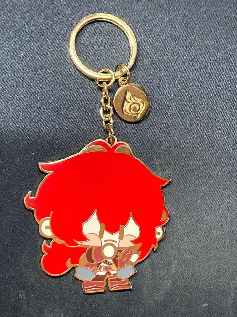 Diluc Official genshin metal keychain, Hobbies & Toys, Memorabilia