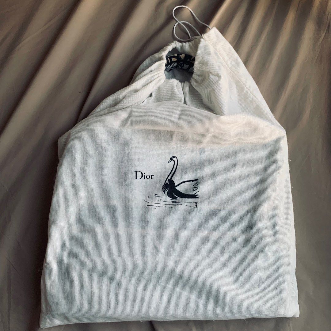 Dior Book Tote Bag (Category: Tote Bags) located in Makati City. Submitted by cath.declutters (Listing ID 1223302005, Image 3). Description: Embroidered not printed! In Oblique Comes with Dust Bag In good condition .