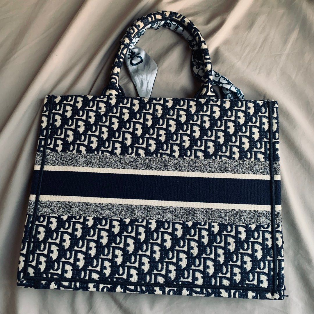 Dior Book Tote Bag (Category: Tote Bags) located in Makati City. Submitted by cath.declutters (Listing ID 1223302005, Image 2). Description: Embroidered not printed! In Oblique Comes with Dust Bag In good condition .