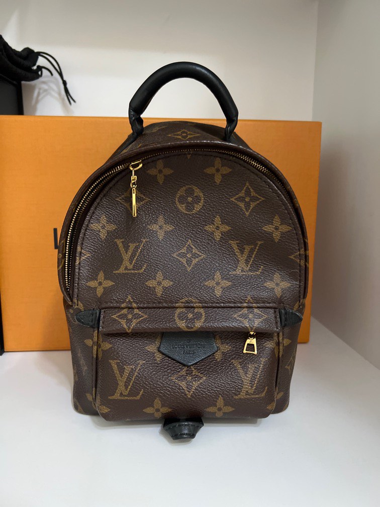 Louis vuitton mini backpack used store