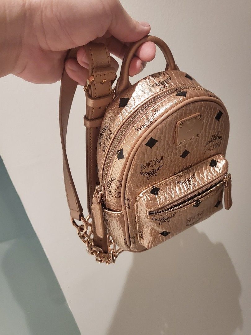 Mcm mini sling backpack store