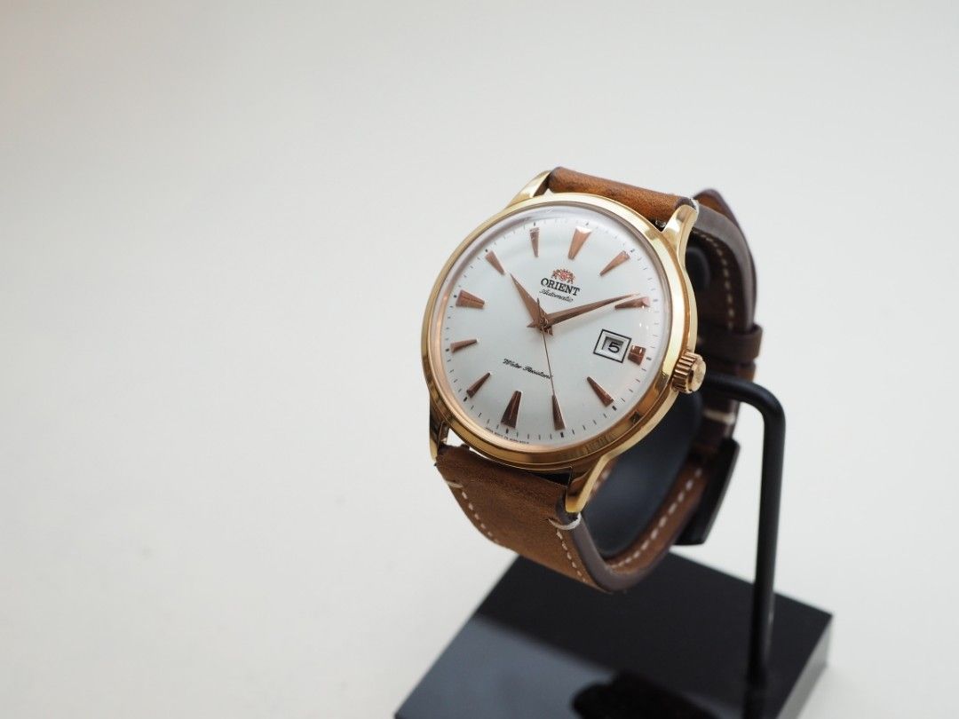 Harga top orient bambino
