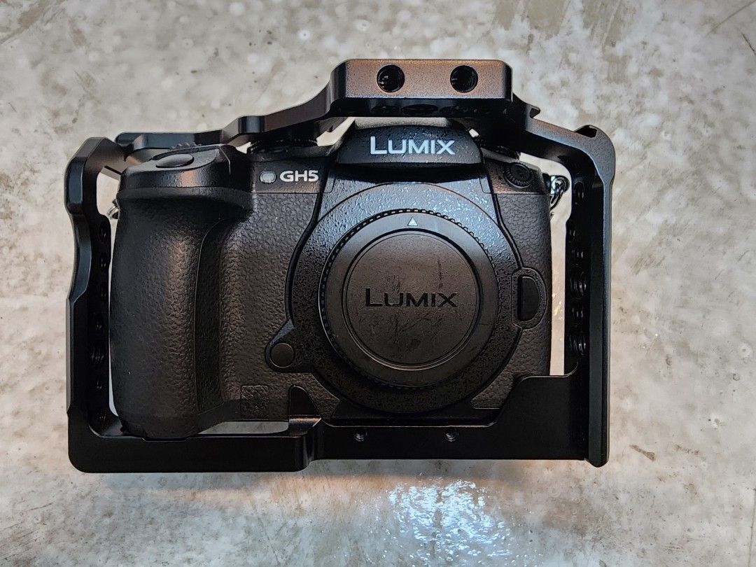 Panasonic GH5 body with cage for sale, Photography, Cameras on Carousell