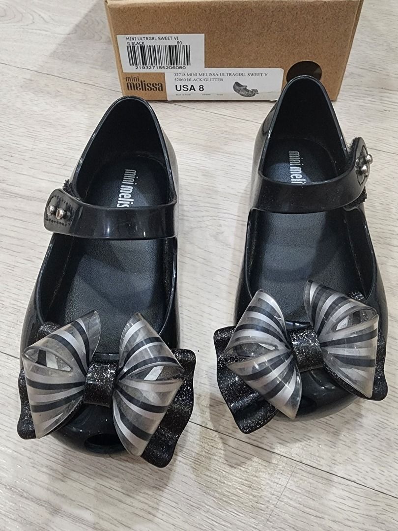 Mini melissa deals black bow shoes