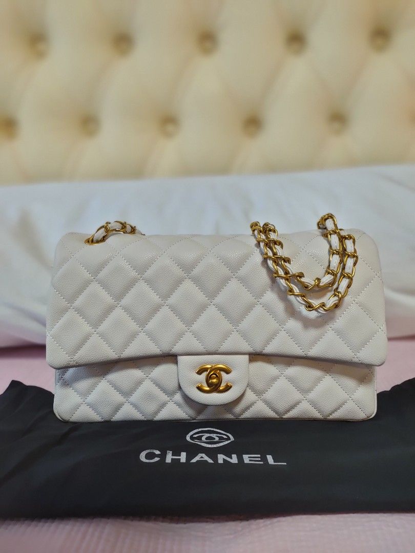 Preloved Chanel White Caviar 30cm (Category: Luxury Bags & Wallets) located in Cebu City. Submitted by elcoleccion21 (Listing ID 1223232610, Image 1). Description: Japan source chanel Double flap 💯 genuine leather 👍 in pristine condition 🎌 walang issue.