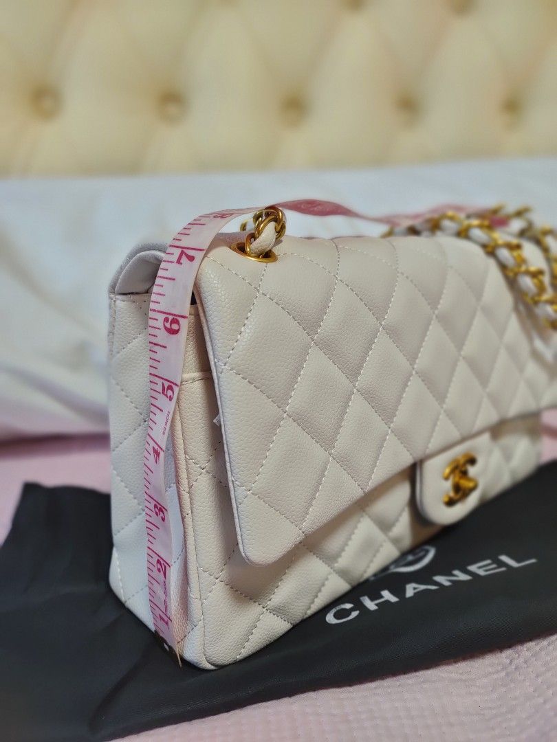 Preloved Chanel White Caviar 30cm (Category: Luxury Bags & Wallets) located in Cebu City. Submitted by elcoleccion21 (Listing ID 1223232610, Image 2). Description: Japan source chanel Double flap 💯 genuine leather 👍 in pristine condition 🎌 walang issue.