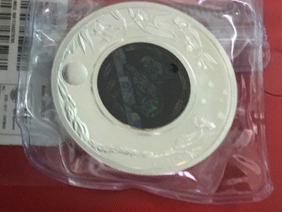 “2012” Opal silver Proof Coin Aus, Perth Koala series Mint (Category: Currency) located in Del Monte. Submitted by bernapi63 (Listing ID 1222417977, Image 1). Description: “2012 “ Australian Black Opal Series Koala 1 oz proof coin limited edition Silver coin (31.104 +grams) weight .9999 fineness “Proof Coin” In plastic protective /blue box included/in very good condition Brilliant Uncirculated .