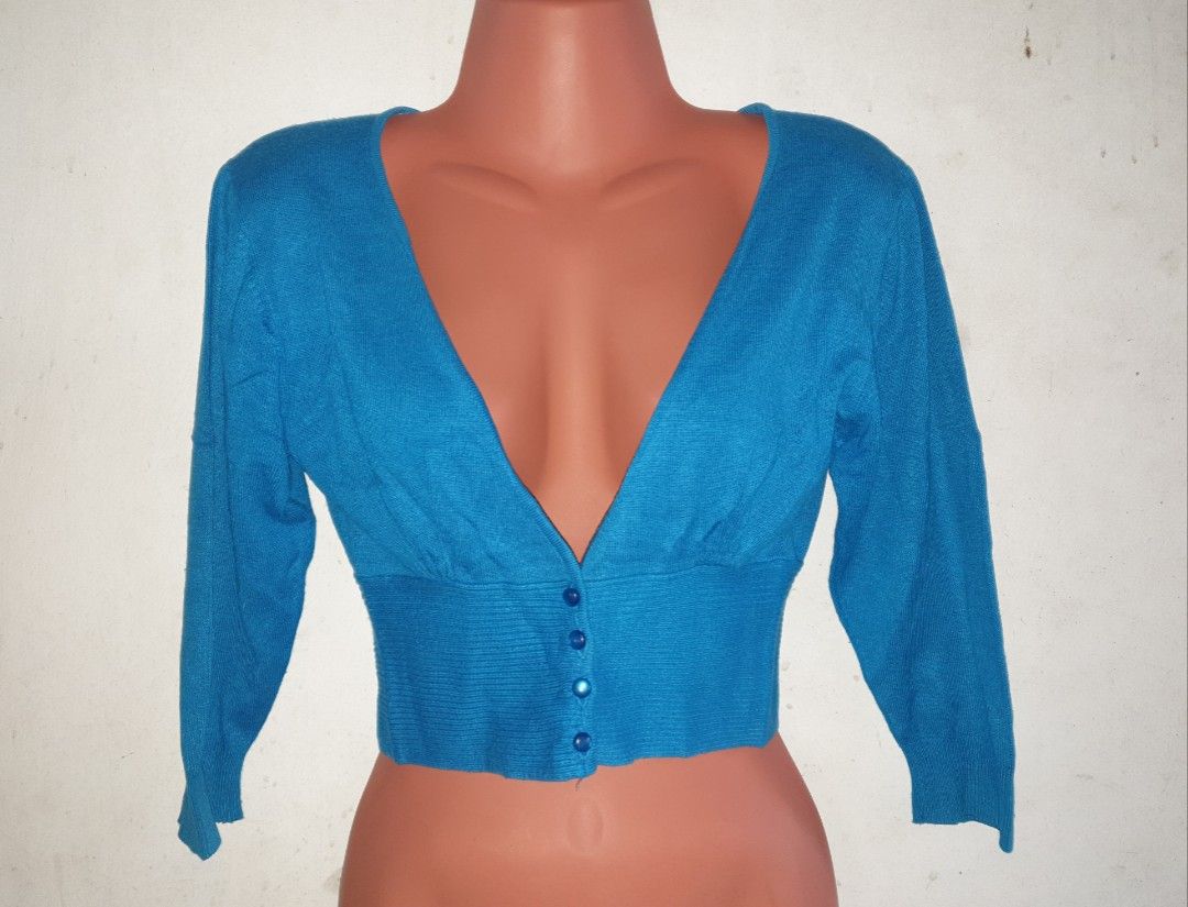 Splash Blue Bolero Cardigan (Category: Coats, Jackets and Outerwear) located in Tagaytay City. Submitted by jingstreasures (Listing ID 1223524565, Image 1). Description: Preloved Splash Blue Bolero Cardigan (wide-neck) brand: Splash size: 12 (on tag) chest - 15 in. waist - 12 in. (Actual colors may slightly vary due to lighting conditions).