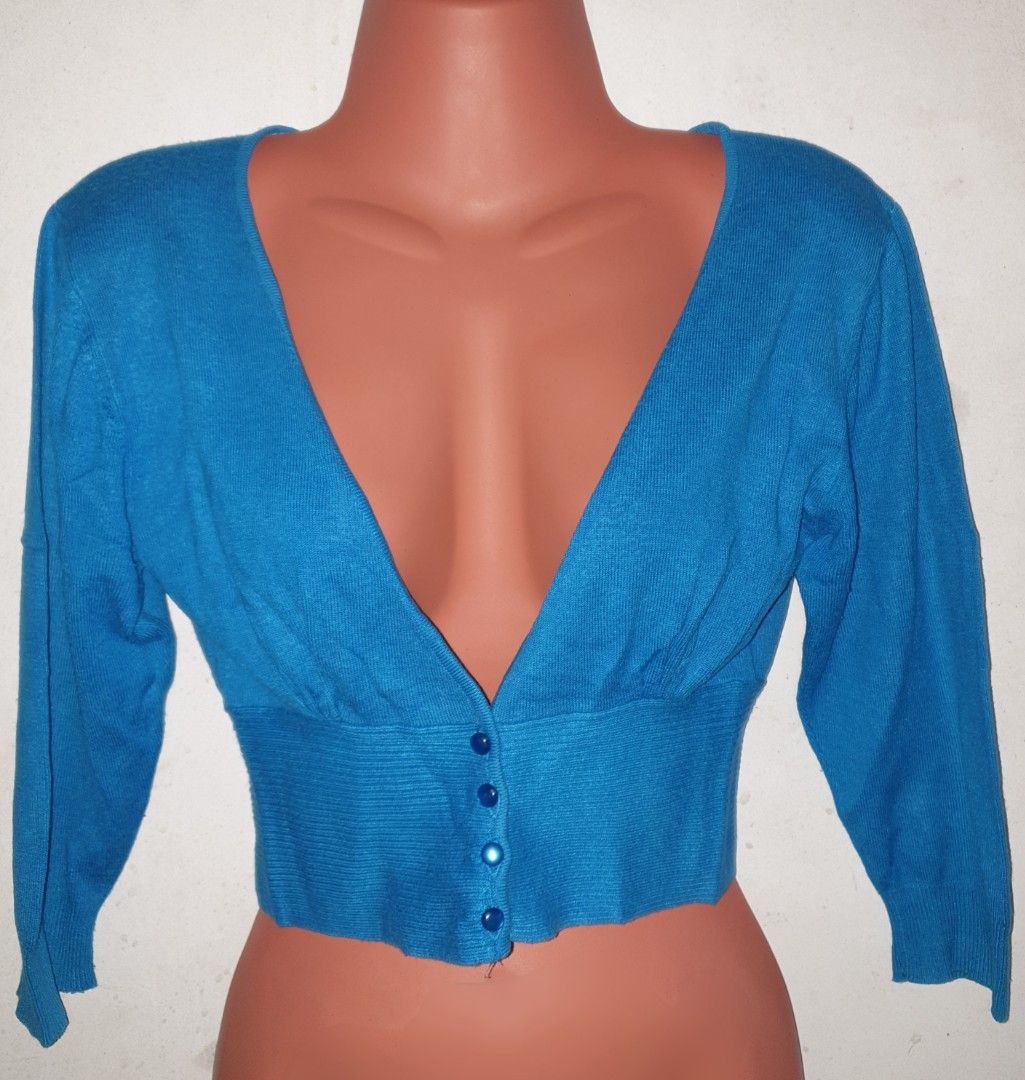 Splash Blue Bolero Cardigan (Category: Coats, Jackets and Outerwear) located in Tagaytay City. Submitted by jingstreasures (Listing ID 1223524565, Image 3). Description: Preloved Splash Blue Bolero Cardigan (wide-neck) brand: Splash size: 12 (on tag) chest - 15 in. waist - 12 in. (Actual colors may slightly vary due to lighting conditions).