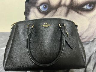 有使用痕跡的牛皮coach包