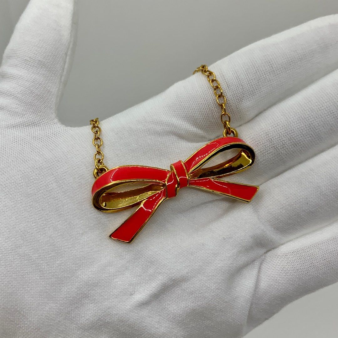 Red ribbon necklace online