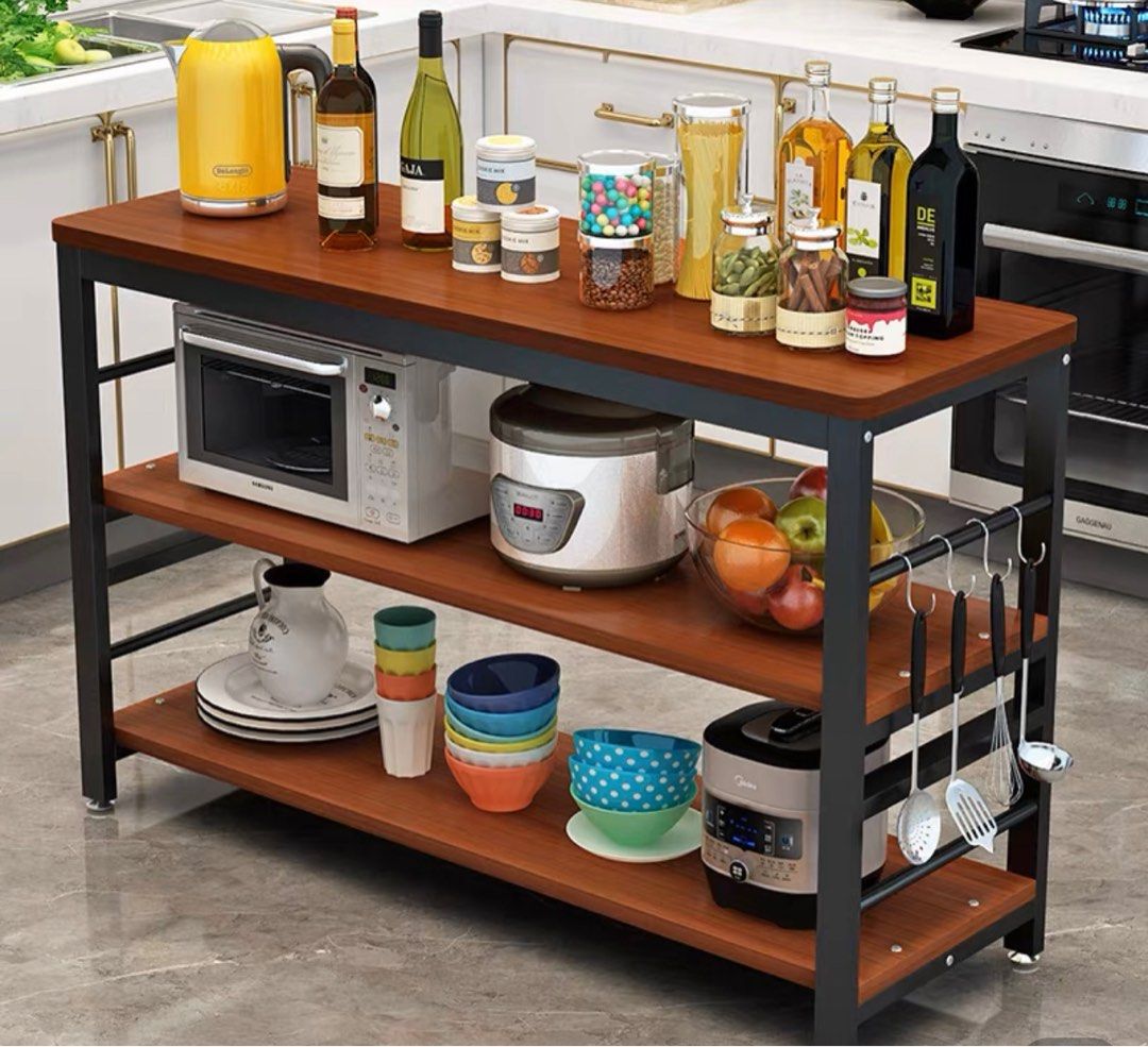 Kitchen Side table (Category: Shelves, Cabinets & Racks) located in Singapore. Submitted by blueberriezz (Listing ID 1223573369, Image 1). Description: 3 layer of Kitchen side table👍🏻👍🏻👍🏻 Dimensions: Length 60cm， Width 40cm，Height 80cm Quality: Very Heavy and thick Weight : Around 13kg 💯Authentic china brand Bought it from Tao Bao Unopened item!!! I’m Moving house recently….. buy extra kitchen side table Item condition 10/10 Unopened !!! N