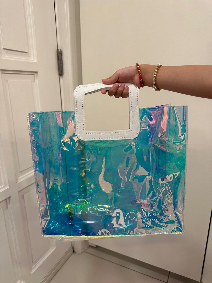 Luminous Iridescent Giveaway bags (Category: Tote Bags) located in Quezon City. Submitted by pukkapenguin (Listing ID 1223415583, Image 2). Description: perfect for using as giveaway bag brand new on hand size 34x30x10 cm .