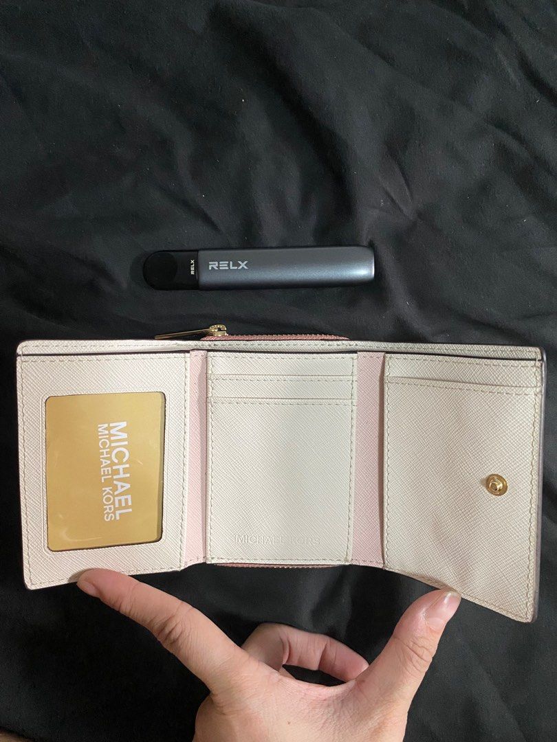 Pink and white michael sales kors wallet