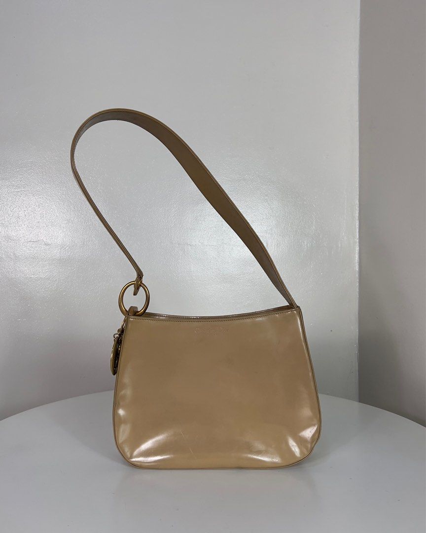 authentic vintage dior tan shoulder bag (Category: Luxury Bags & Wallets) located in San Juan City. Submitted by sadandboujie (Listing ID 1223519152, Image 3). Description: - will ignore lowball offers! - shipping from san juan, mm - currently in med, so apologies if i don’t respond right away or have the time to entertain extra inquiries :( - bags are all second hand/ vintage and have signs of wear - last pics show slight wear on strap which was