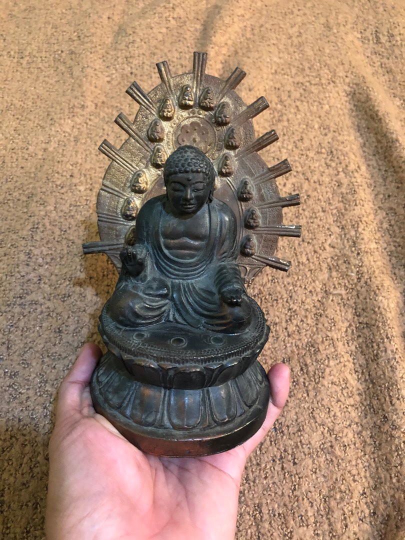 Vintage old tin buddha desk statue on Carousell